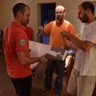 Taping the 'fish' to make it visually look like the real thing; from left Filipe, Nuno and Joao Pereira.