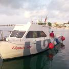 The AUV teams rented fishing boat, Vitamin Sea, approaching the dock in Olhao.